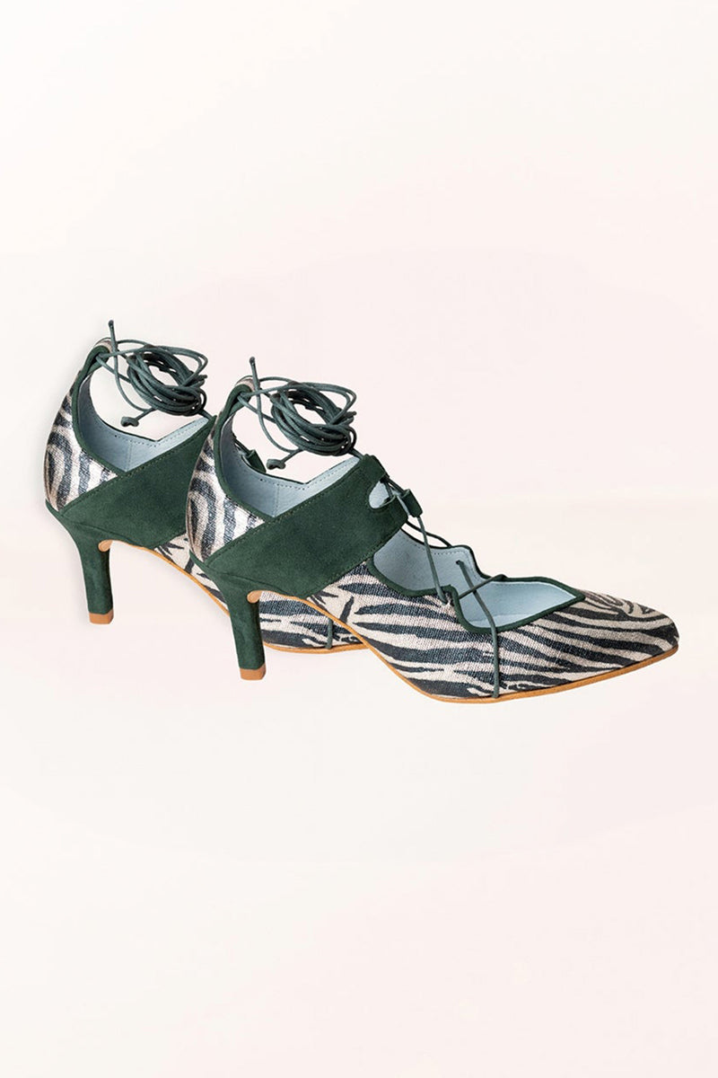 Goya Heel Bottle